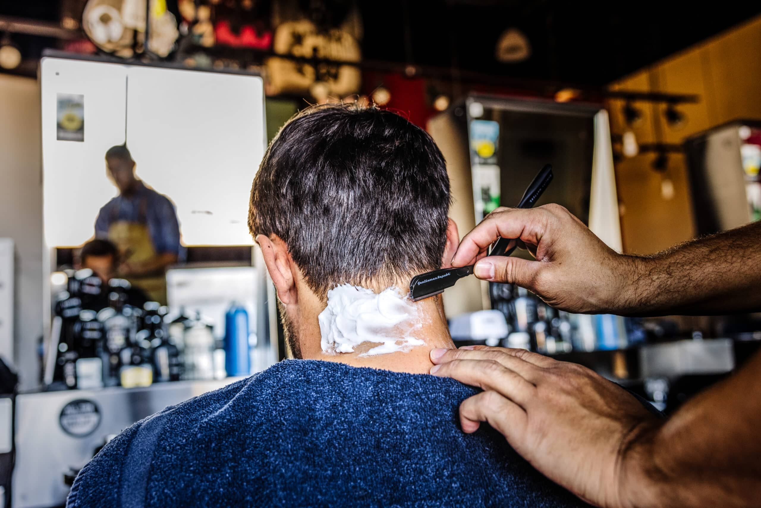 Neck clean up during hair cut at Floyd's Barbershop